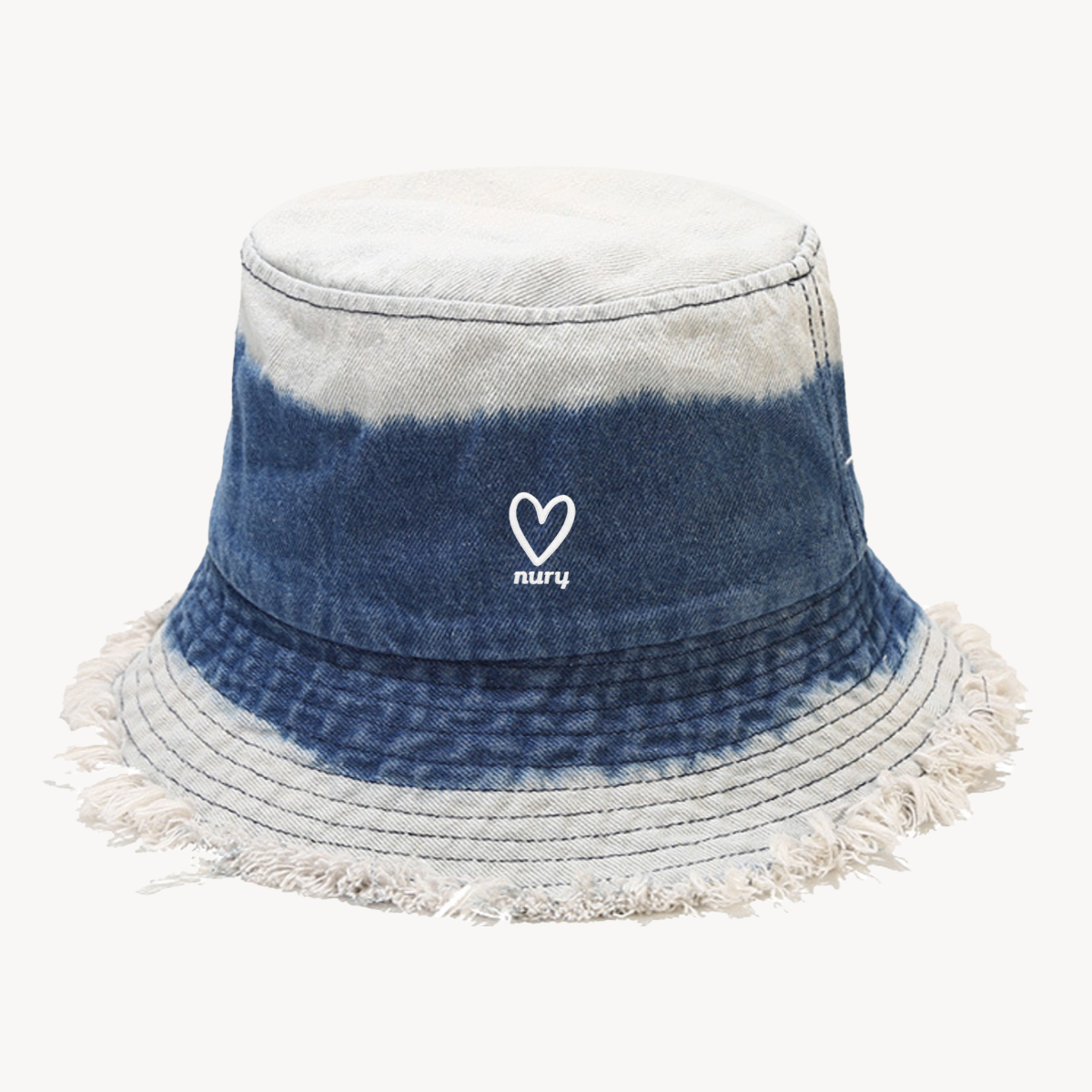 Frayed Edge Bucket Hat in Tie Dye Blue Denim with heart embroidery
